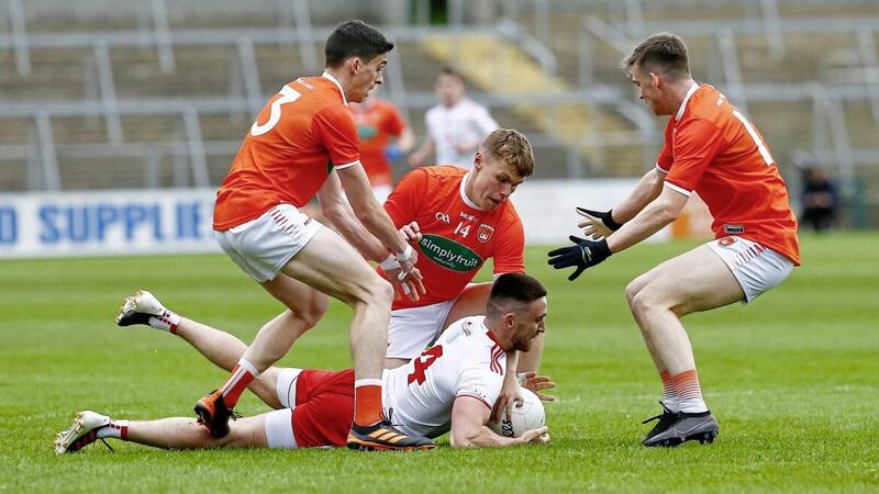 Tyrone and captain Padraig Hampsey were brought down to earth and knocled out of the Championship by old rivals Armag. Pic Philip Walsh 