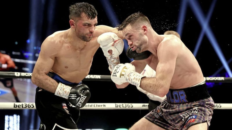 Jack Catterall (left) in action against champion Josh Taylor in their super-lightweight world title clash at the OVO Hydro, Glasgow.on Saturday night Picture by Steve Welsh/PA Wire. 