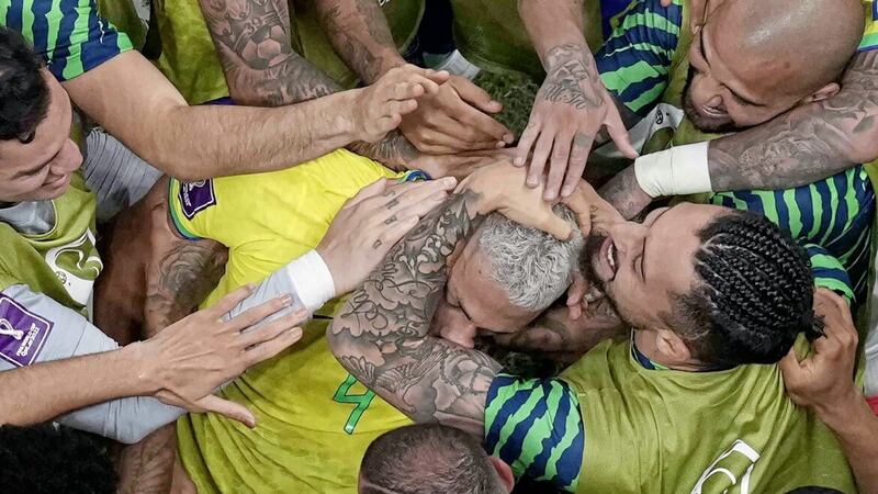 The Brazil players celebrate Richarlison&#39;s brilliant second goal in last night&#39;s World Cup win over Serbia. Picture by AP 