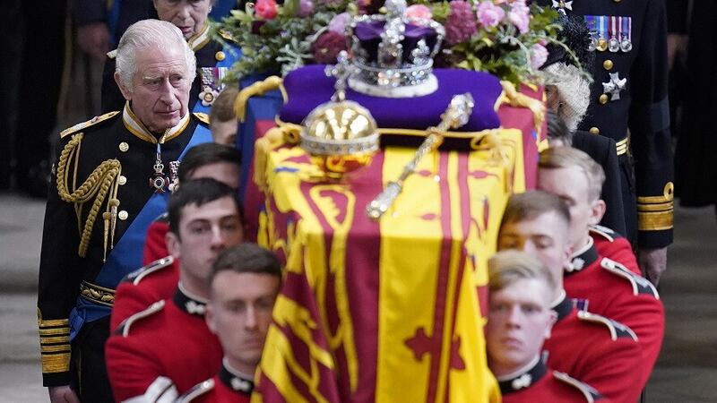 King Charles III and members of the royal family follow behind the coffin of Queen Elizabeth II. Picture by Danny Lawson, PA