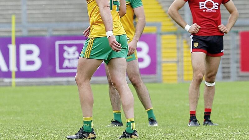 Donegal's Michael Murphy leaves the field injured during the preliminary round win over Down.<br />Pic Philip Walsh