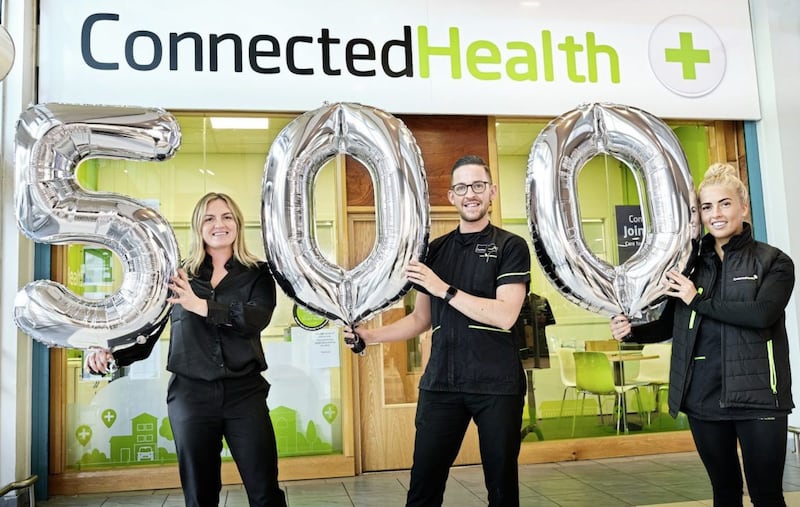 Announcing the Connected Health jobs are its director of clinical services and training Theresa Morrison with care assistants Christopher Brady and Amy Napier 