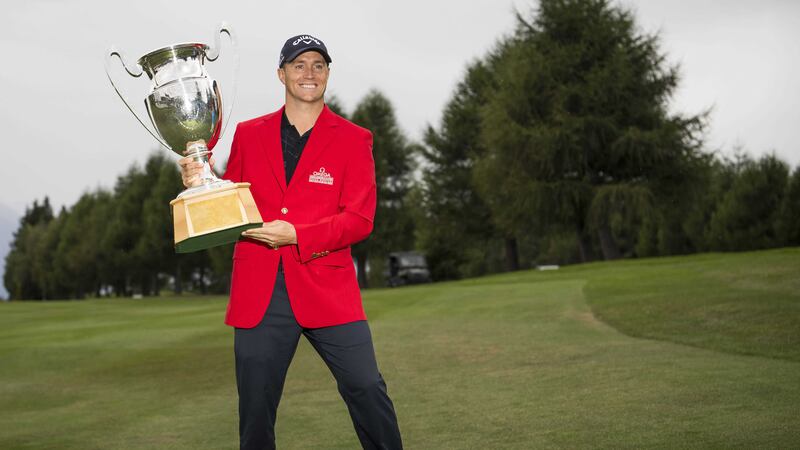Alex Noren poses with the trophy after winning the Omega European Masters in Crans-Montana, Switzerland on Sunday<br />Picture by AP