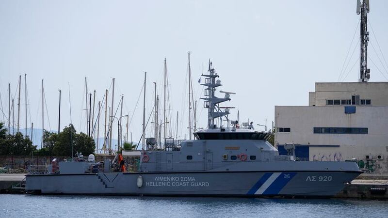 A Greek coastguard vessel is docked at the port in Kalamata (AP Photo/Thanassis Stavrakis)