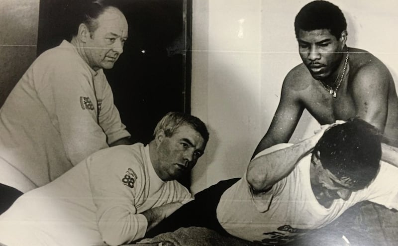 Ready to rumble. From left: BJ Eastwood, Eddie Shaw and Bernardo Checa get Dave Boy McAuley in shape 
