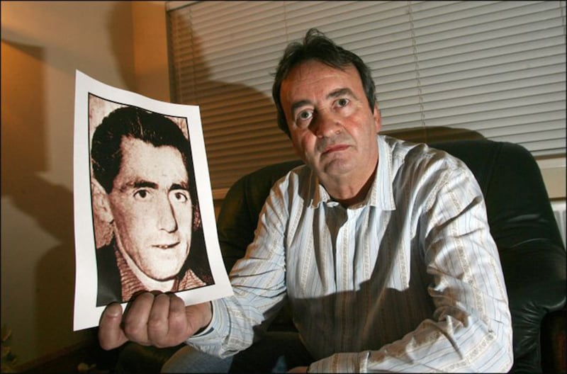 &nbsp;Gerry Conlon with a picture of his father Giuseppe, who died in jail
