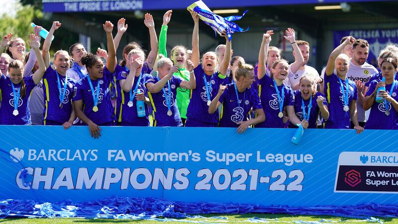 Chelsea’s Magdalena Eriksson lifts the Barclays FA Women’s Super League trophy after a 4-2 victory over Manchester United