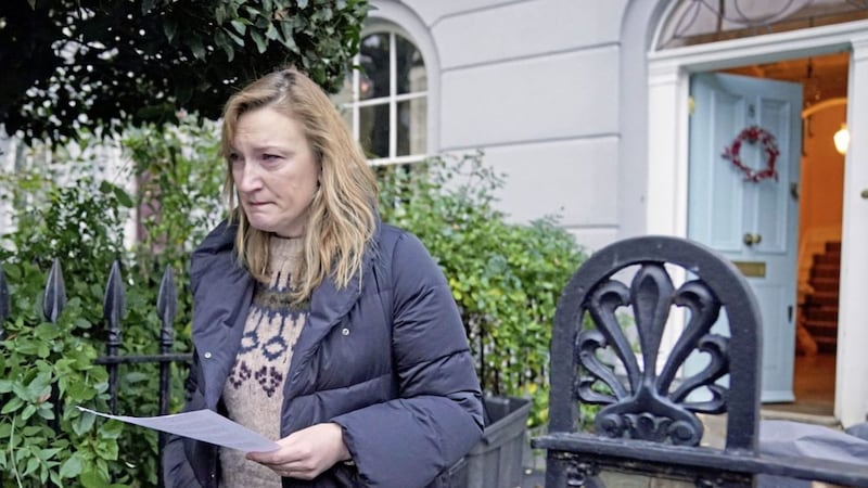 A tearful Allegra Stratton talks to reporters outside her London home on Wednesday after resigning as an adviser to Boris Johnson amid controversy about a Christmas party held in Downing Street last Christmas. Picture by Jonathan Brady/PA Wire 