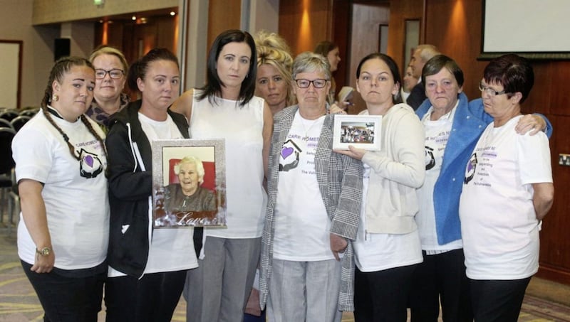 Some of the families at yesterday's press conference in Dunmurry Manor Care Home. Picture by Hugh Russell