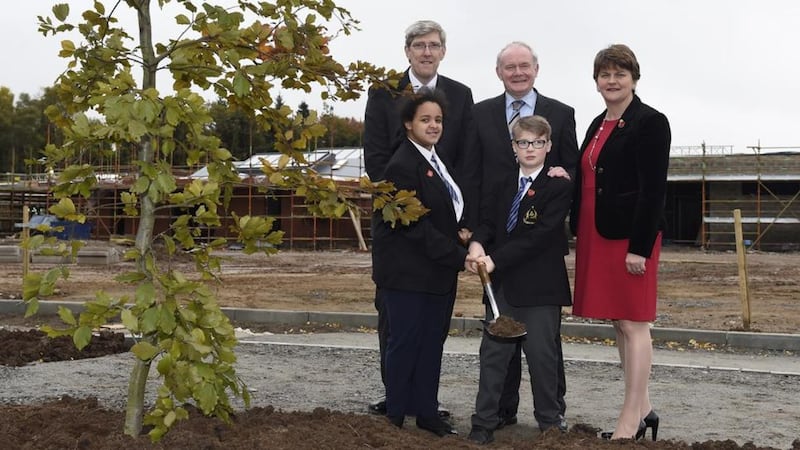 Former education minister John O&#39;Dowd with Arlene Foster and Martin McGuinness at the Strule campus in Omagh 