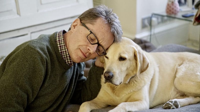 Nicky Campbell with his faithful golden Labrador Maxwell 