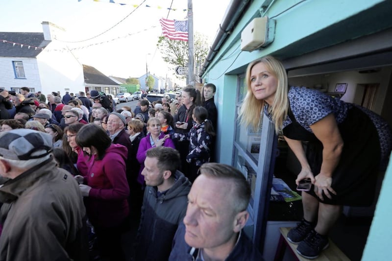 Crowds gather round a restaurant in the village of Doonbeg in County Clare on the first day of US President Donald Trump's visit to the Republic. Picture by Niall Carson/PA Wire