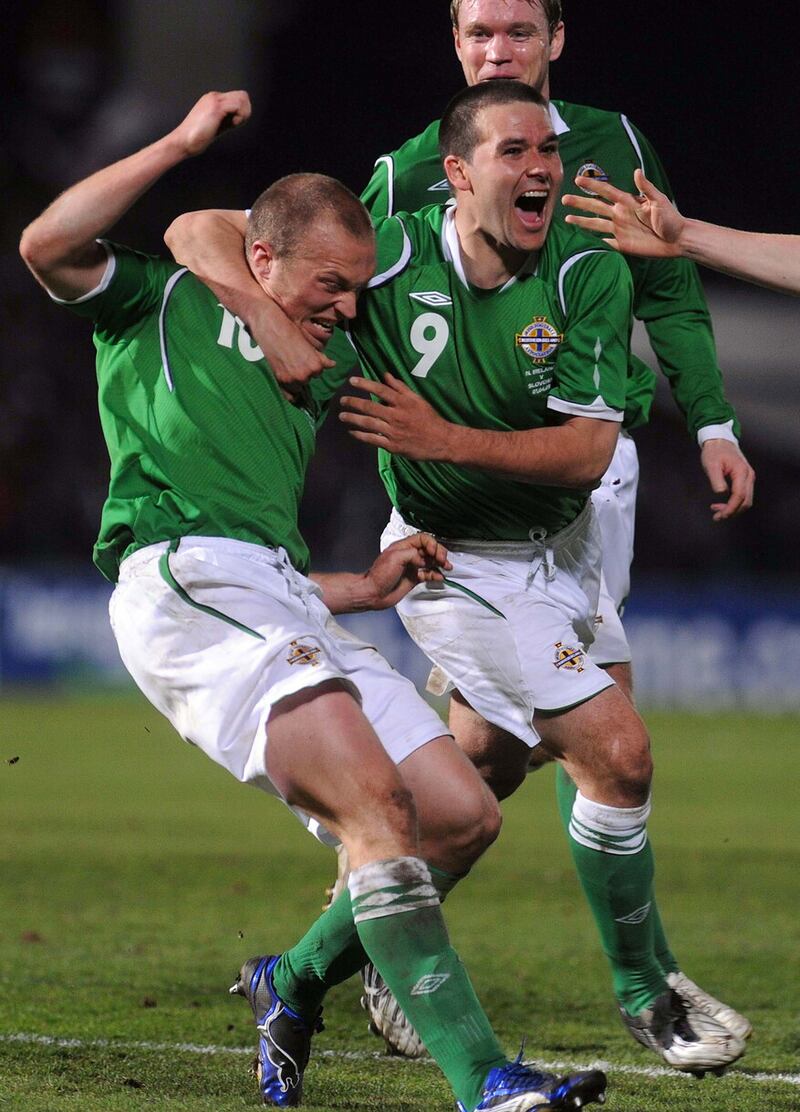 Warren Feeney and David Healy were strike partners with Northern Ireland but will be in opposite dugouts for Tuesday night's Bet McLean League Cup match at the Oval
