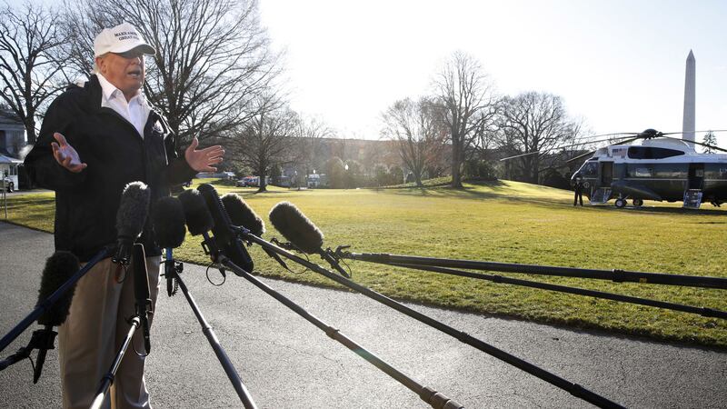 President Donald Trump speaks to the media as he leaves the White House yesterday en route for a trip to the border in Texas as the government shutdown continues. Picture by Jacquelyn Martin/AP&nbsp;