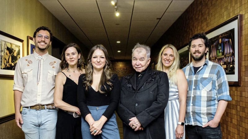 Oh Boy records artists, including Kelsey Waldon, with the late John Prine, pictured centre, and Fiona Whelan Prine. 