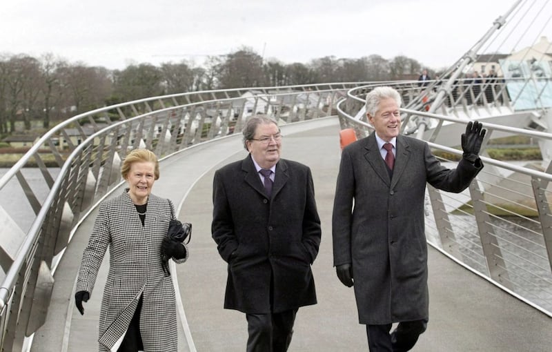 John Hume and his wife Pat with former US President Bill Clinton during a visit to Derry in 2014. Picture by Margaret McLaughlin 