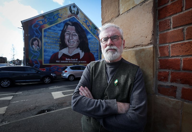 Former president of Sinn Fein Gerry Adams in front of a mural of hunger striker Bobby Sands in west Belfast. Picture by Mal McCann