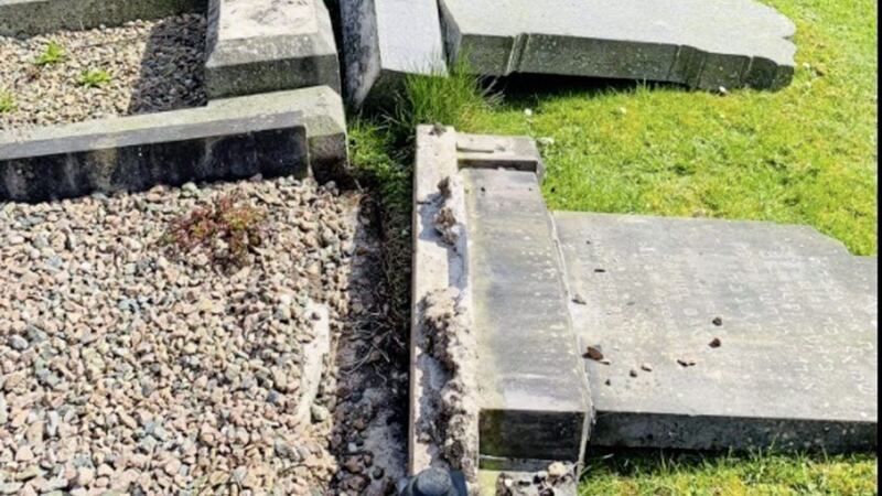 CCTV is being examined after 10 headstones in the Jewish plot at the City Cemetery in west Belfast were damaged by vandals
