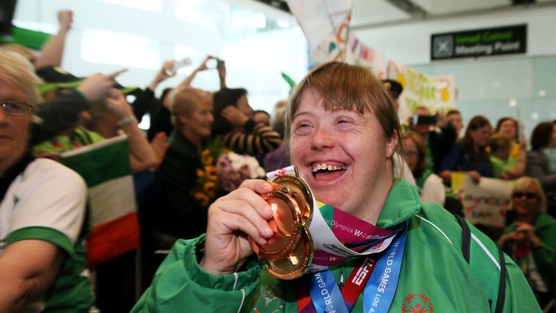 Special Olympics Team Ireland athlete Amy Quinn arrives back to a rapturous welcome at Dublin Airport having competed in the 2015 games in Los Angeles. Picture by Brian Lawless, PA Wire