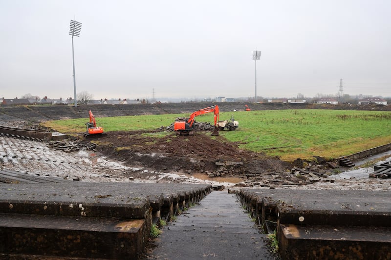 Diggers start pulling up the standing area of Casement Park in west Belfast. PICTURE: MAL MCCANN