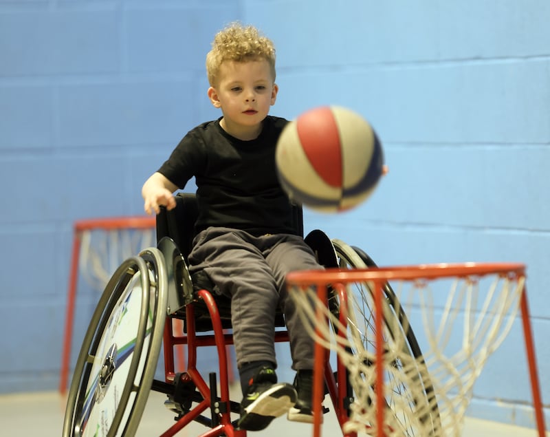 Conor Bradley (4) wheelchair basketball at the limb loss sports day at the Olympia Leisure Centre. PICTURE: MAL MCCANN