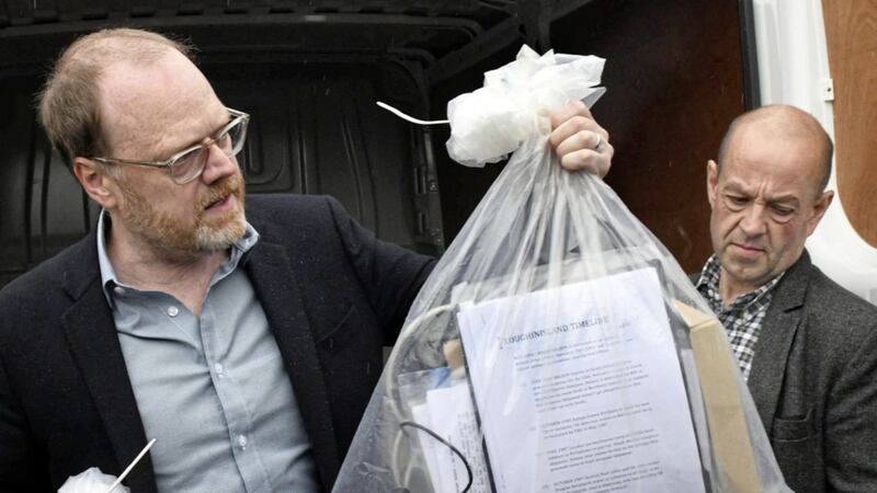 Journalists Trevor Birney and Barry McCaffrey at Castlereagh Police Station in east Belfast after having all the materials and computers returned to them after a High Court ruling that the PSNI acting on behalf of Durham Police had no legal right to the materials. Picture by Alan Lewis/Photopress 