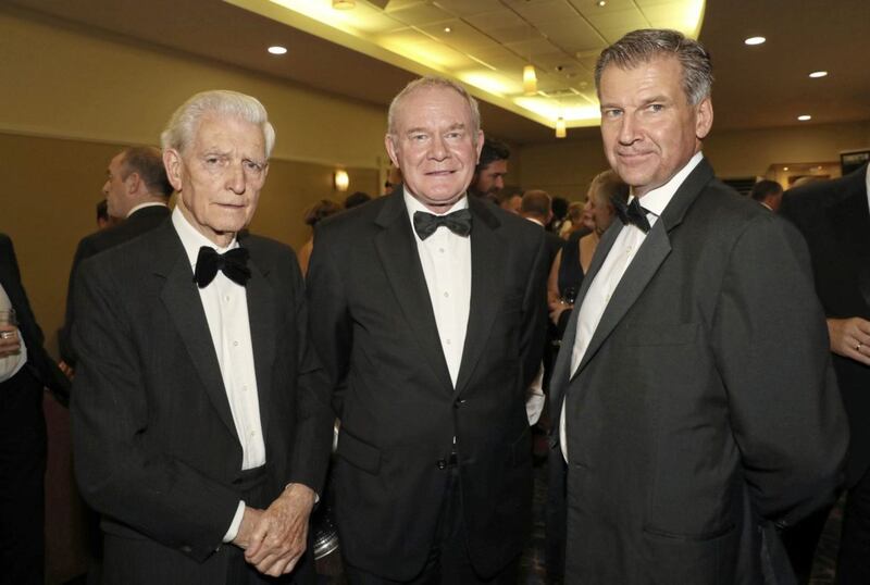 Jim Fitzpatrick with former Deputy First Minister Martin McGuinness and editor Noel Doran at the Irish News Ulster All Stars in Armagh City Hotel in 2016. Picture by Declan Roughan 