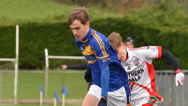 Rossa&#39;s Dominic McEnhill under pressure from Paul Langtry of Cavan side Southern Gaels in the Paul McGirr U16 tournament quarter-final. Picture by Martin McGlone                                     