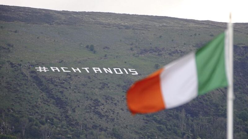 Irish language advocates set up a sign on Black Mountain in Belfast at the weekend. Picture by Mal McCann 
