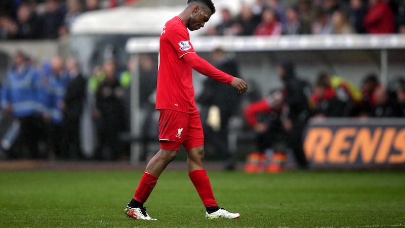 Daniel Sturridge trudges off after Liverpool's defeat to Swansea at the Liberty Stadium on Sunday<br />Picture by PA&nbsp;