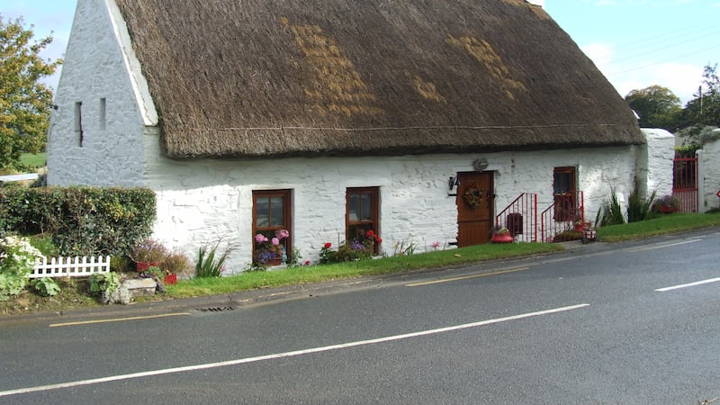 The thatched cottage, pictured at Ballindrait near Lifford, has been an iconic image of Ireland for decades. Picture by Donegal county council.