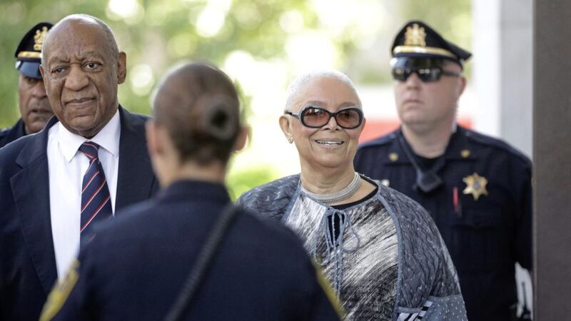 Bill Cosby arrives at court with his wife Camille Cosby. It is the first day a family member has accompanied him to court. Picture by Matt Rourke, Associated Press 