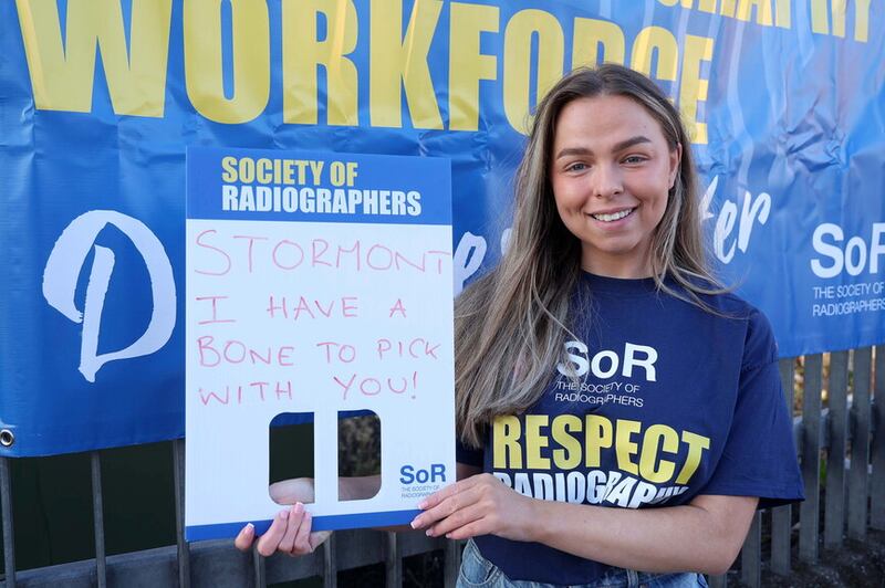 Radiographer Rachael Beggs on the picket line at the Royal Victoria Hospital as thousands of health and social care workers in Northern Ireland have begun a 48-hour strike as part of a pay dispute. Picture Mal McCann.