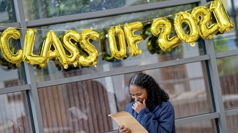 Jaida Richards reacts as she opens her GCSE results at Ark Burlington Danes Academy, in west London. Picture by Dominic Lipinski/PA Wire 
