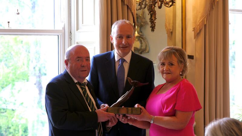 Colin and Eithne Bell with Tánaiste and foreign affairs minister Micheál Martin at Iveagh House in Dublin.