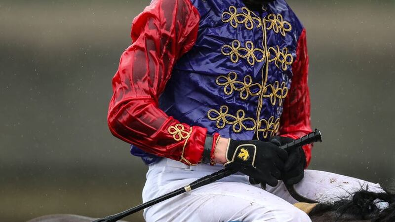 The royal racing colours will be represented on the day of the coronation (David Davies/PA)