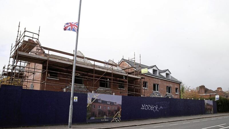 Flag outside new housing during construction on the Cavehill Road in north Belfast 
