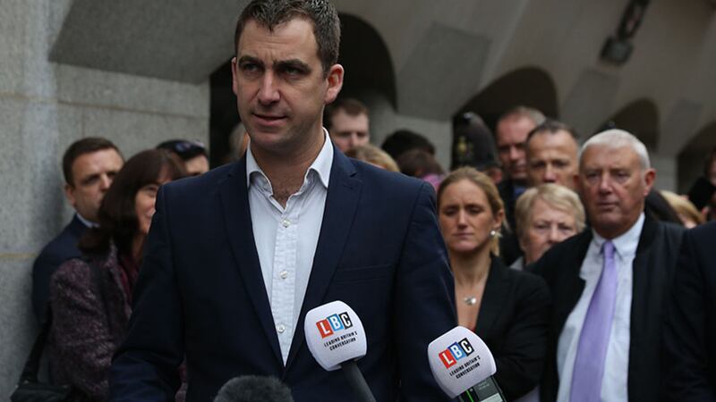 Jo Cox's father Gordon Leadbeater (right) and sister Kim Leadbeater look on as her widower Brendan Cox speaks outside the Old Bailey in London after Thomas Mair was found guilty of the murder of Labour MP Jo Cox&nbsp;