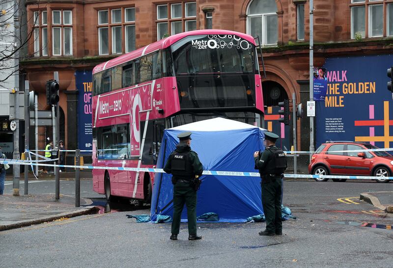 Police at the scene of the accident involving a bus in Donegall Square West. PICTURE: MAL MCCANN.