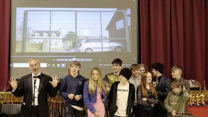 Seamus Hanna, principal of St Colmcille&#39;s High School in Crossgar, pictured with pupils from 9O who made Framed, a short movie, which won the school&#39;s inaugural film festival 