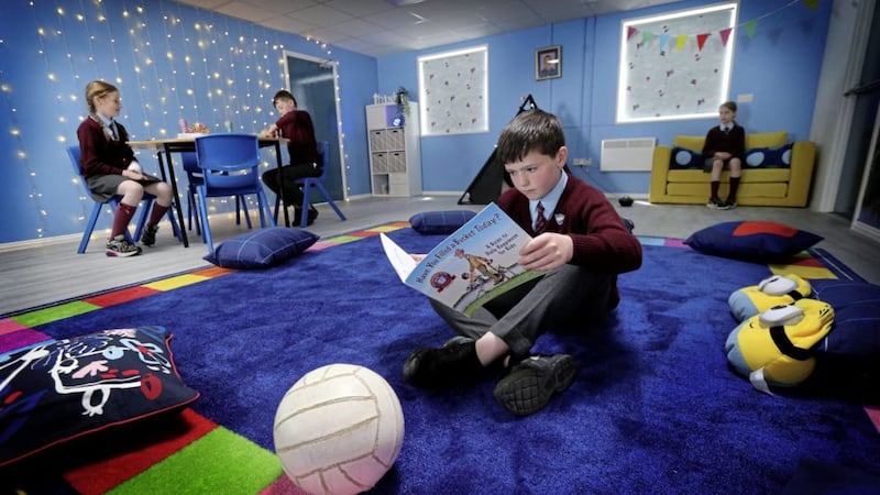 Frankie McGoldrick with P7 pupils are among the first to use Christopher&#39;s Cabin at St Patrick&rsquo;s PS, Donaghmore. Picture by Hugh Russell 