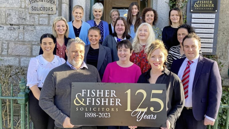 The Fisher &amp; Fisher Newry team with owners Ronan McGuigan and Jacqueline Malone. Fisher &amp; Fisher also has offices in Kilkeel, Newcastle, Rathfriland, Belfast and Donaghadee 