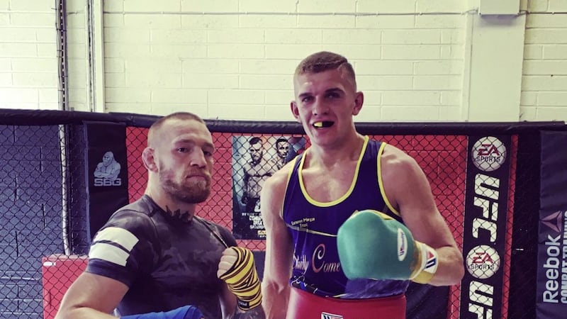 Conor Wallace, right, with UFC star Conor McGregor who invited him to Las Vegas to help him train in 2016 