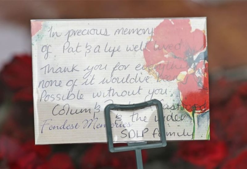 &nbsp;A message on flowers at the funeral of Pat Hume