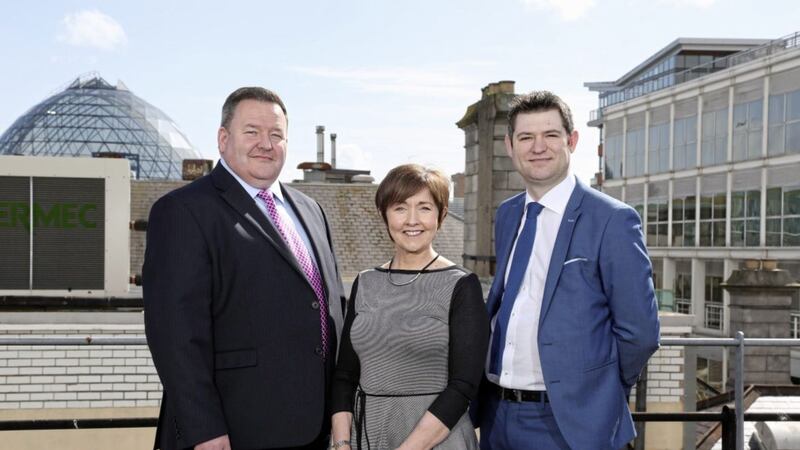 Brian Murphy (BDO), Maureen O&rsquo;Reilly (Economist for the QES) and Chris Morrow (NI Chamber) pictured after the launch of the latest Quarterly Economic Survey. Picture by Darren Kidd/Press Eye   