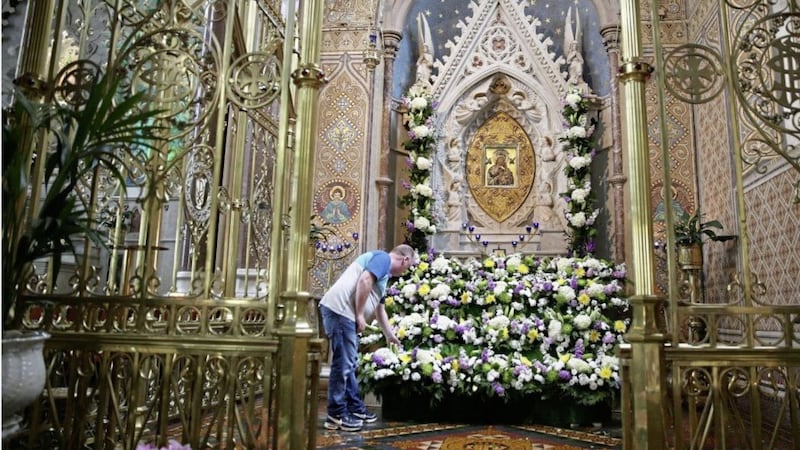 Putting the finishing touches ahead of the Clonard Novena. Picture by Hugh Russell. 