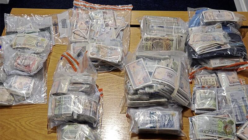A joint 2017 PSNI and HMRC search of one criminal&#39;s property yielded &pound;65,500 of cash, a Range Rover and a TAG Heuer watch purchased as a result of criminality 