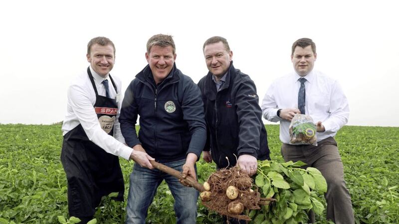 Darren Dickson (left) from EuroSpar Carrowdore and David McCallion (right) from Henderson Wholesale pictured with Richard Orr from William Orr &amp; Son and Noel McGregor, Henderson Wholesale&rsquo;s fresh trading manager. Orr is one of 19 local suppliers to the new Greengrocer&rsquo;s brand