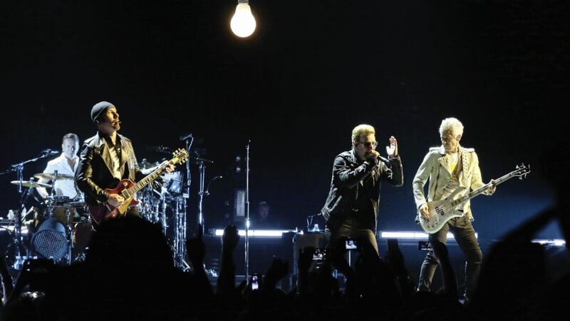 U2 performing at a sold-out gig in Belfast in 2015 