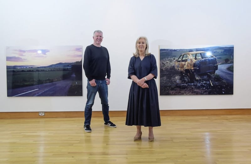 Willie Doherty with WHERE co-curator Anne Stewart of National Museums NI. Picture by Simon Graham 